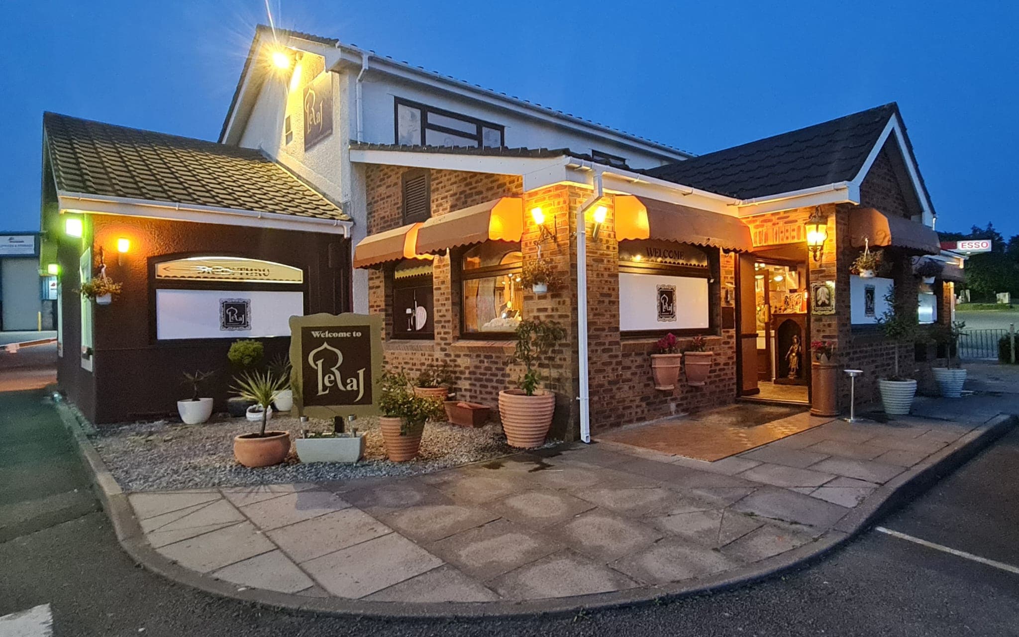 Leraj entrance lit up at dusk