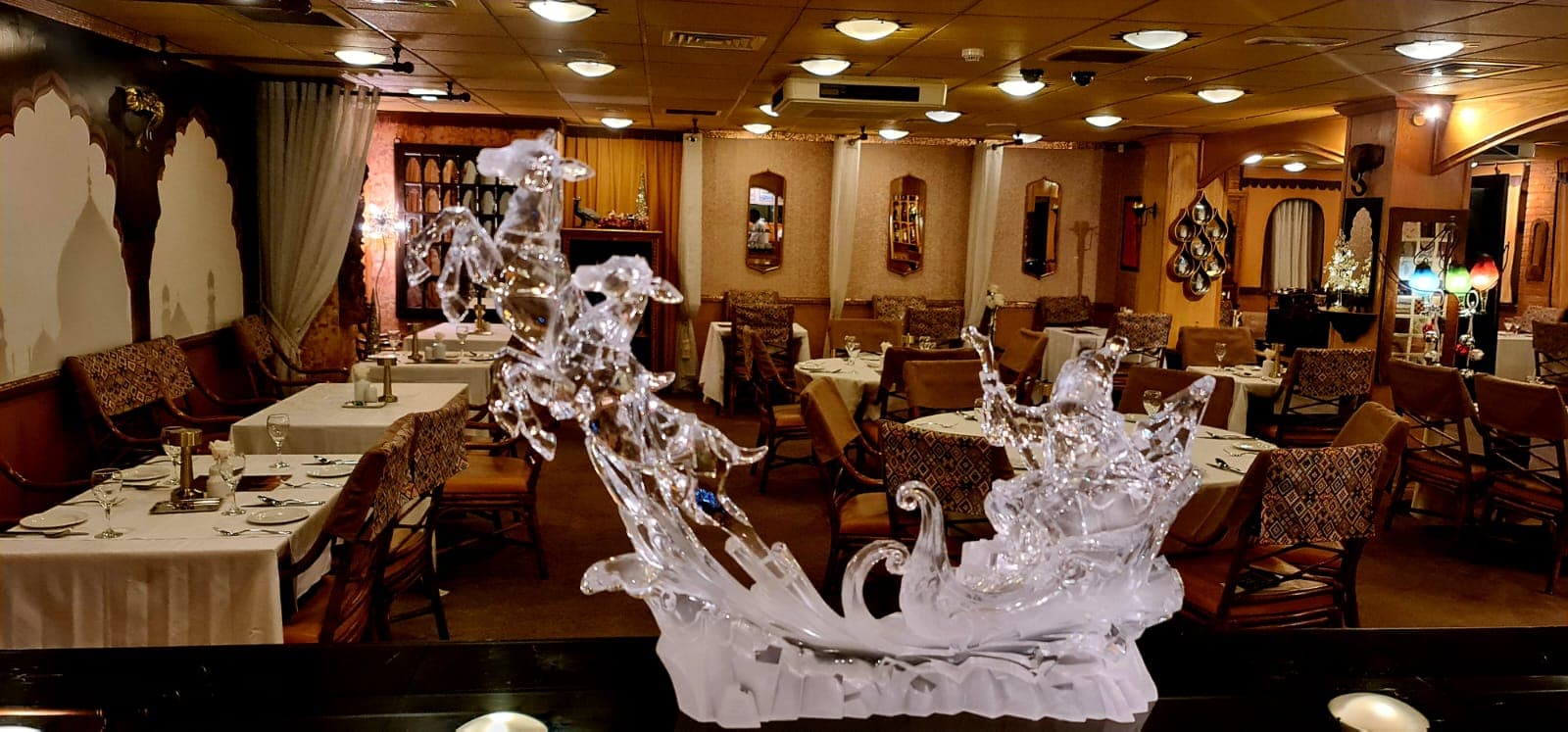 Full spread with prawns, naan and sides from above